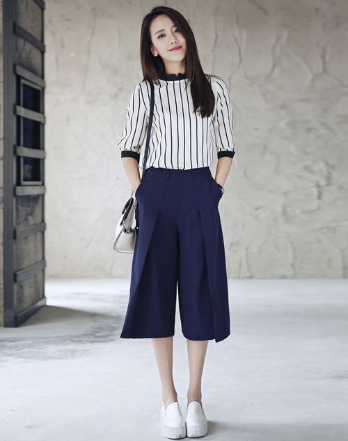 藏青色短裤搭配什么颜色上衣好看 夏季清爽穿搭指南-美派服饰网(图1)