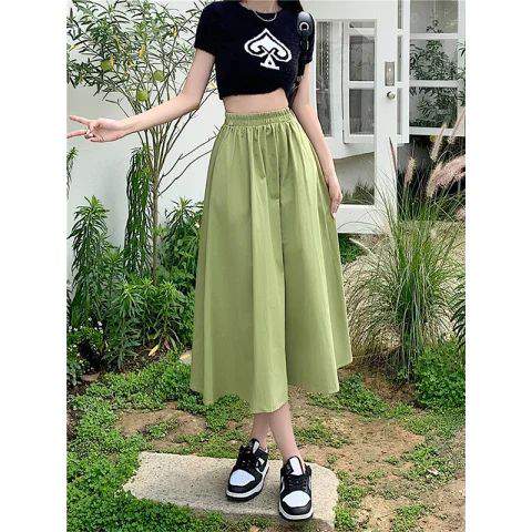 绿色半身裙搭配技巧，6种时尚穿搭方法展现清新自然风格-美派服饰网(图2)